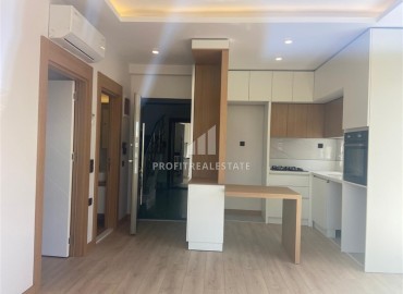Квартира 1+1 по привлекательной цене в новостройке, со стильной чистовой отделкой и встроенной кухней, Дошемеалты, Анталья ID-16417 фото-4