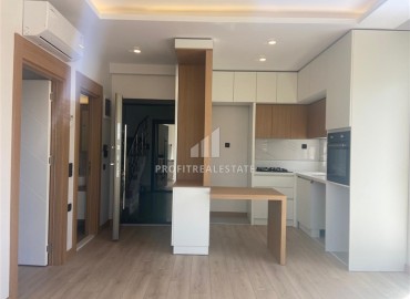 Apartment 1+1 at an attractive price in a new building, with stylish finishing and a built-in kitchen, Doşemealti, Antalya ID-16417 фото-5