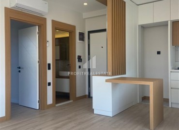 Квартира 1+1 по привлекательной цене в новостройке, со стильной чистовой отделкой и встроенной кухней, Дошемеалты, Анталья ID-16417 фото-8