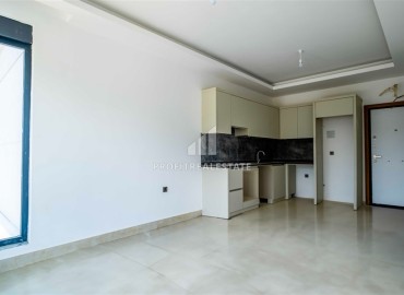 One bedroom apartment 52 m², unfurnished, fully finished in a modern new building, Mahmutlar, Alanya ID-16420 фото-2