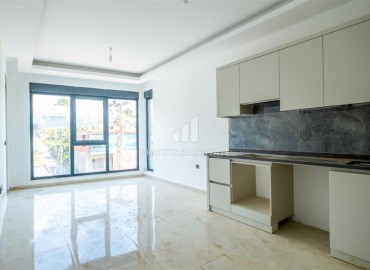 One bedroom apartment 52 m², unfurnished, fully finished in a modern new building, Mahmutlar, Alanya ID-16420 фото-3