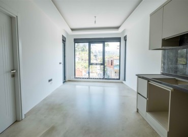 One bedroom apartment 52 m², unfurnished, fully finished in a modern new building, Mahmutlar, Alanya ID-16420 фото-4