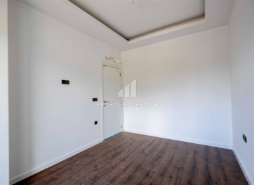 Двухкомнатная квартира 52 м², без мебели, с чистовой отделкой в современной новостройке, Махмутлар, Аланья ID-16420 фото-7