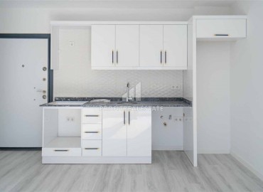 Недорогая квартира 1+1 с чистовой отделкой и кухонным гарнитуром в современном комплексе в Авсалларе, Аланья ID-16442 фото-3