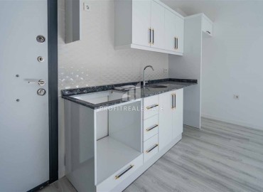 Inexpensive 1+1 apartment with fine finishing and kitchen unit in a modern residence in Avsallar, Alanya ID-16442 фото-4