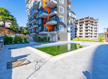 Inexpensive 1+1 apartment with fine finishing and kitchen unit in a modern residence in Avsallar, Alanya ID-16442 фото-12
