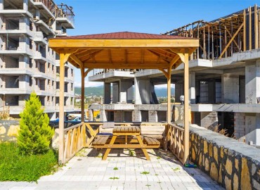Inexpensive 1+1 apartment with fine finishing and kitchen unit in a modern residence in Avsallar, Alanya ID-16442 фото-14