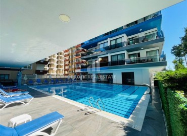 Stylish one bedroom duplex, 65m², in a premium residence on the seafront in Mahmutlar, Alanya ID-16445 фото-9