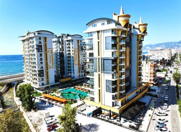 Furnished 1+1 apartment with sea views in a premium residential residence on the first coastline, Mahmutlar, Alanya ID-16448 фото-1