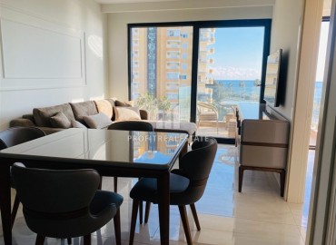 Furnished 1+1 apartment with sea views in a premium residential residence on the first coastline, Mahmutlar, Alanya ID-16448 фото-2