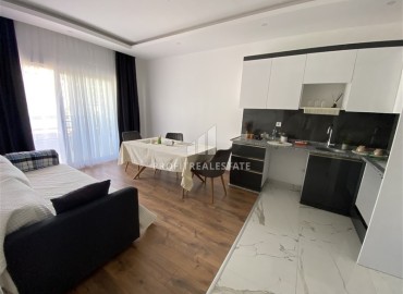 One bedroom apartment, 48 m², in a new building with extensive facilities in the Oba area, Alanya. ID-14954 фото-2