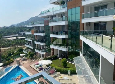 Stylish two bedroom apartment, 135m², with a huge terrace in an elite residence in Alanya - Cikcilli ID-16459 фото-1
