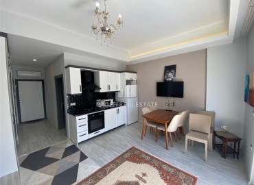 Inexpensive elegantly furnished one-bedroom apartment in a residence with facilities, Mahmutlar, Alanya ID-16466 фото-3
