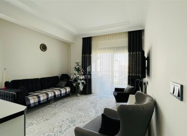 Элегантная квартира с одной спальней, 60м², в резиденции с хорошей инфраструктурой в Махмутларе, Алания ID-16471 фото-3