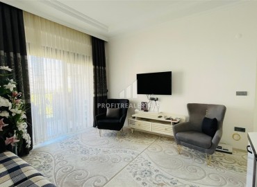 Элегантная квартира с одной спальней, 60м², в резиденции с хорошей инфраструктурой в Махмутларе, Алания ID-16471 фото-4