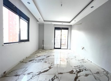 Двухкомнатные апартаменты с премиальной чистовой отделкой, 55м², в комфортабельной новостройке в Махмутларе, Алания ID-16474 фото-3