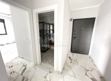 Двухкомнатные апартаменты с премиальной чистовой отделкой, 55м², в комфортабельной новостройке в Махмутларе, Алания ID-16474 фото-5