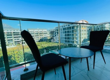 Stylish, modernly furnished 1+1 apartment, 100 meters from the sea, in a residence with facilities, Kargicak, Alanya ID-16478 фото-13