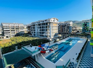 Stylish, modernly furnished 1+1 apartment, 100 meters from the sea, in a residence with facilities, Kargicak, Alanya ID-16478 фото-14