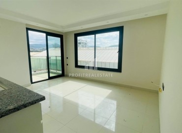 Трёхкомнатная квартира 90м², без мебели, в современной новостройке в 500 метрах от моря, Махмутлар, Аланья ID-16479 фото-4