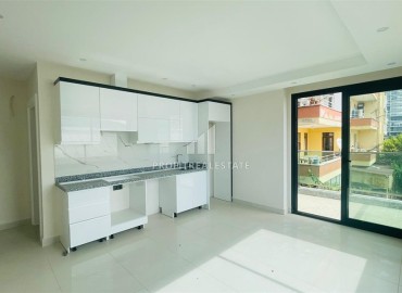 Трёхкомнатная квартира 90м², без мебели, в современной новостройке в 500 метрах от моря, Махмутлар, Аланья ID-16479 фото-6