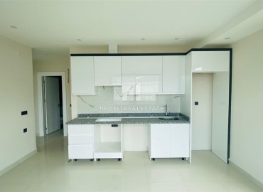 Трёхкомнатная квартира 90м², без мебели, в современной новостройке в 500 метрах от моря, Махмутлар, Аланья ID-16479 фото-7