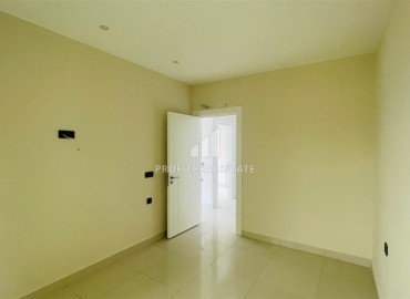 Трёхкомнатная квартира 90м², без мебели, в современной новостройке в 500 метрах от моря, Махмутлар, Аланья ID-16479 фото-10