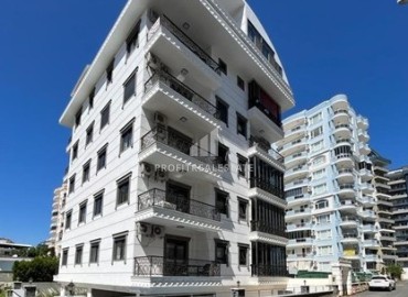Элегантная двухкомнатная квартира по доступной цене, в комплексе с инфраструктурой, в 500 метрах от моря, Махмутлар, Аланья ID-16499 фото-1