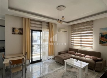 Элегантная двухкомнатная квартира по доступной цене, в комплексе с инфраструктурой, в 500 метрах от моря, Махмутлар, Аланья ID-16499 фото-4