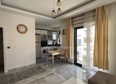 Elegant one-bedroom apartment at an affordable price, in a residence with facilities, 500 meters from the sea, Mahmutlar, Alanya ID-16499 фото-5
