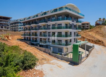 Apartment 1+1, 50m², with designer interior and private garden in a new residence with facilities in Oba, Alanya ID-16504 фото-1