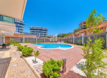 Apartment 1+1, 50m², with designer interior and private garden in a new residence with facilities in Oba, Alanya ID-16504 фото-10
