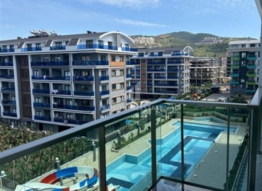 Elegant furnished 1+1 apartment, 100 meters from the sea, in a residence with rich facilities, Kargicak, Alanya ID-15130 фото-16