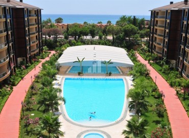 Luxurious three bedroom apartment with separate kitchen, 135m², on the first coastline in Oba, Alanya ID-16517 фото-1