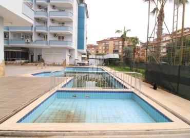 Apartment with two bedrooms and three balconies, 100m², in a residence with a swimming pool, by the sea in Oba, Alanya ID-16525 фото-18
