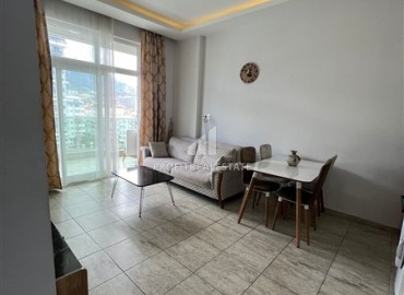 Стильные апартаменты с одной спальней, 58м², в современной резиденции с бассейном, в 250м от моря в Махмутларе, Алания ID-16539 фото-3