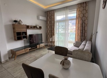Stylish one bedroom apartment, 58m², in a modern residence with a swimming pool, 250m from the sea in Mahmutlar, Alanya ID-16539 фото-4