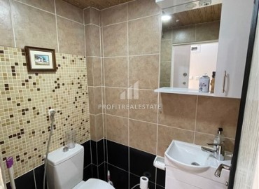 Two bedroom apartment, 75m², renovated, 250m from the sea in an inexpensive house in the center of Oba, Alanya ID-16541 фото-10