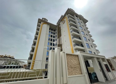 One-bedroom apartment by the sea in a residence under construction, in the center of Alanya, 53 m2 ID-12736 фото-1