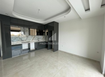 One-bedroom apartment by the sea in a residence under construction, in the center of Alanya, 53 m2 ID-12736 фото-2