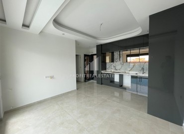 One-bedroom apartment by the sea in a residence under construction, in the center of Alanya, 53 m2 ID-12736 фото-3