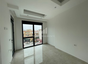 One-bedroom apartment by the sea in a residence under construction, in the center of Alanya, 53 m2 ID-12736 фото-5