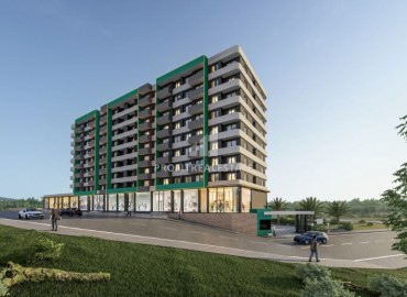 Инвестиционный проект комфорт класса на начальном этапе строительства в районе Томюк, Эрдемли: квартиры, 53-92м². ID-16547 фото-2