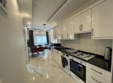 One-bedroom furnished apartment, 46m², in a modern residence in the very center of Alanya ID-16550 фото-3