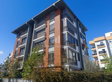 Unfurnished one bedroom apartment, with built-in kitchen, in a modern residence with facilities, Guzeloba, Antalya ID-16553 фото-1