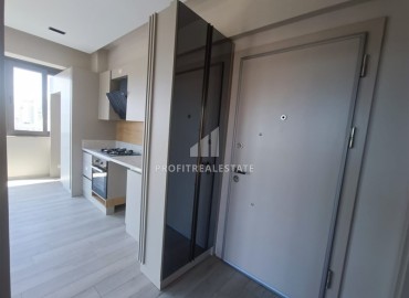 Unfurnished one bedroom apartment, with built-in kitchen, in a modern residence with facilities, Guzeloba, Antalya ID-16553 фото-6