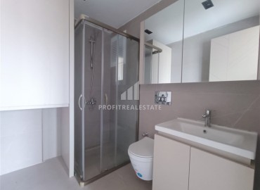 Unfurnished one bedroom apartment, with built-in kitchen, in a modern residence with facilities, Guzeloba, Antalya ID-16553 фото-9