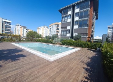 Unfurnished one bedroom apartment, with built-in kitchen, in a modern residence with facilities, Guzeloba, Antalya ID-16553 фото-18