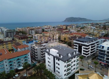 New one bedroom apartment, 45 m², in an urban house 50 m from the sea in Oba, Alanya, at a competitive price ID-15454 фото-1