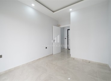 New one bedroom apartment, 45 m², in an urban house 50 m from the sea in Oba, Alanya, at a competitive price ID-15454 фото-8